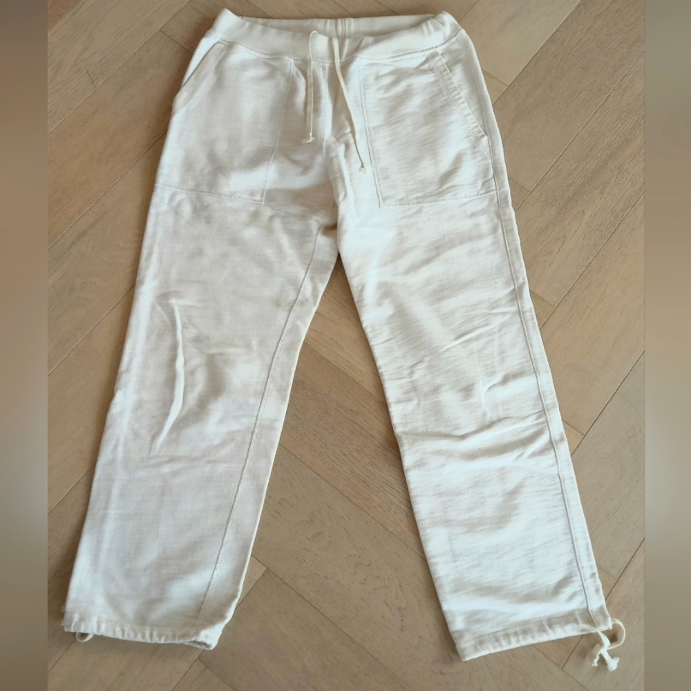 Illustrated example. Sweatpants. Made in Canada. Cream White